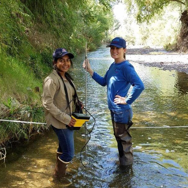 female hydrology students in the field
